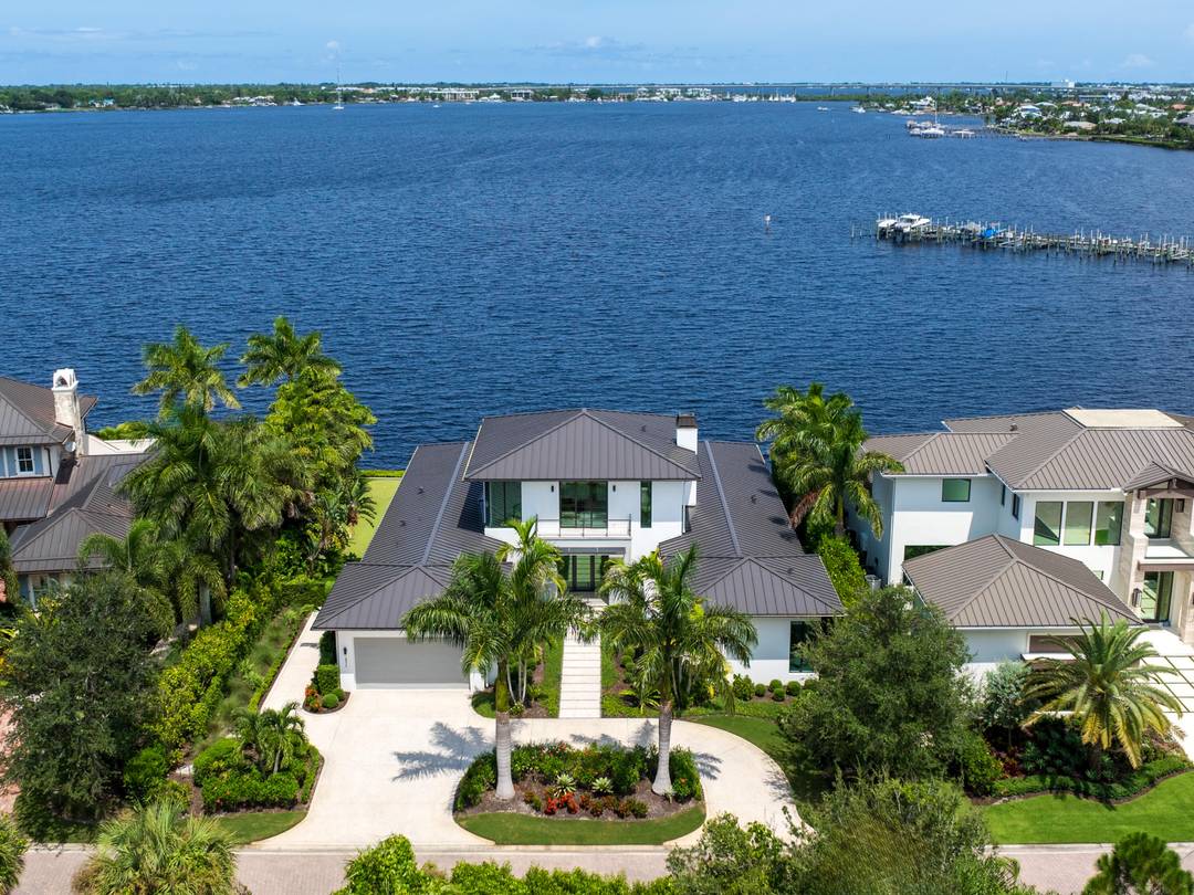 Luxury is redefined in the Floridian National Golf Club with this custom waterfront residence.