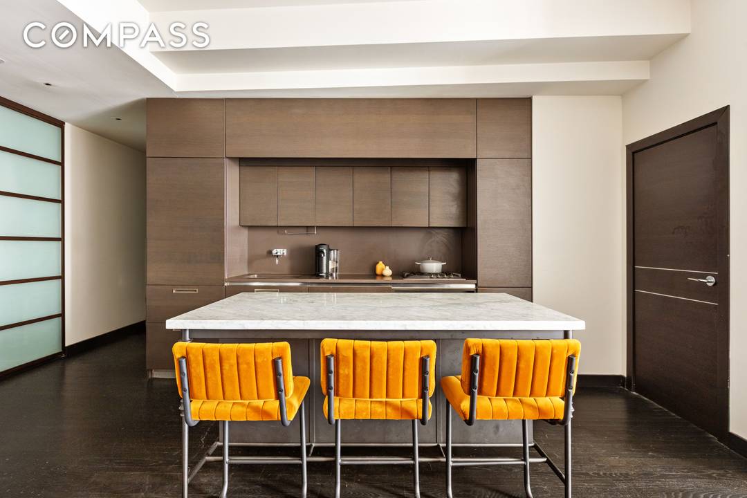 Sleek sophistication meets smart design in this expansive 1, 100 square foot loft like unit at The Collection, designed by Armani.