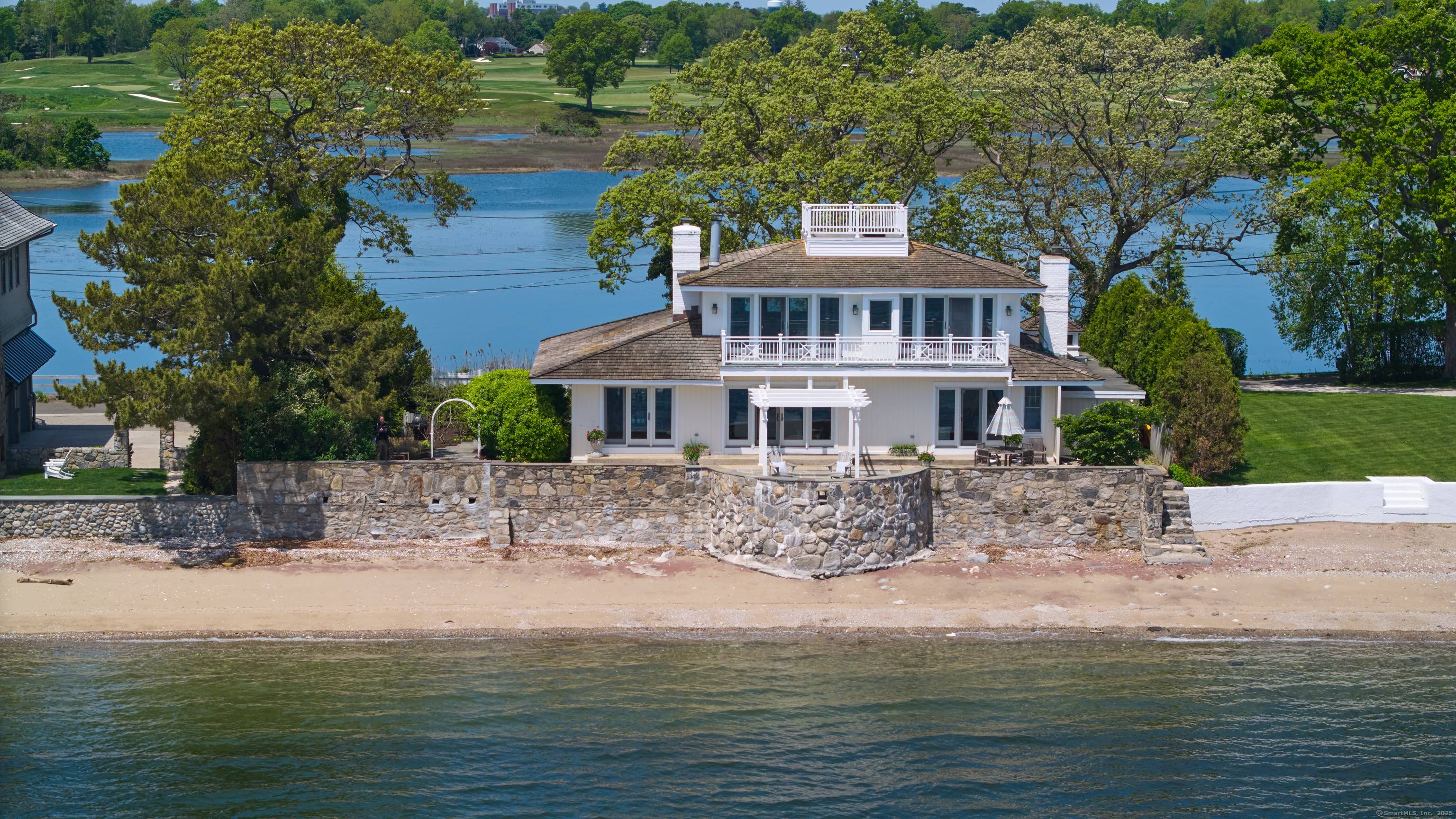 Exclusive Waterfront Retreat in Gated Island Community Just One Hour from NYC.
