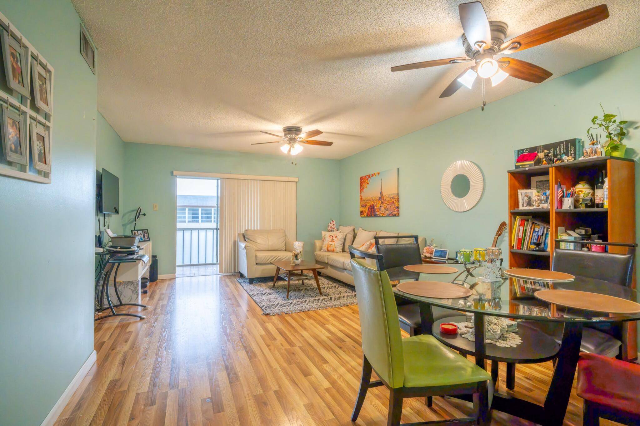 Lovely, spacious, and bright 2BR 2BA condo on the 2nd floor of a charming building in Margate's active 55 community, Oriole Gardens.