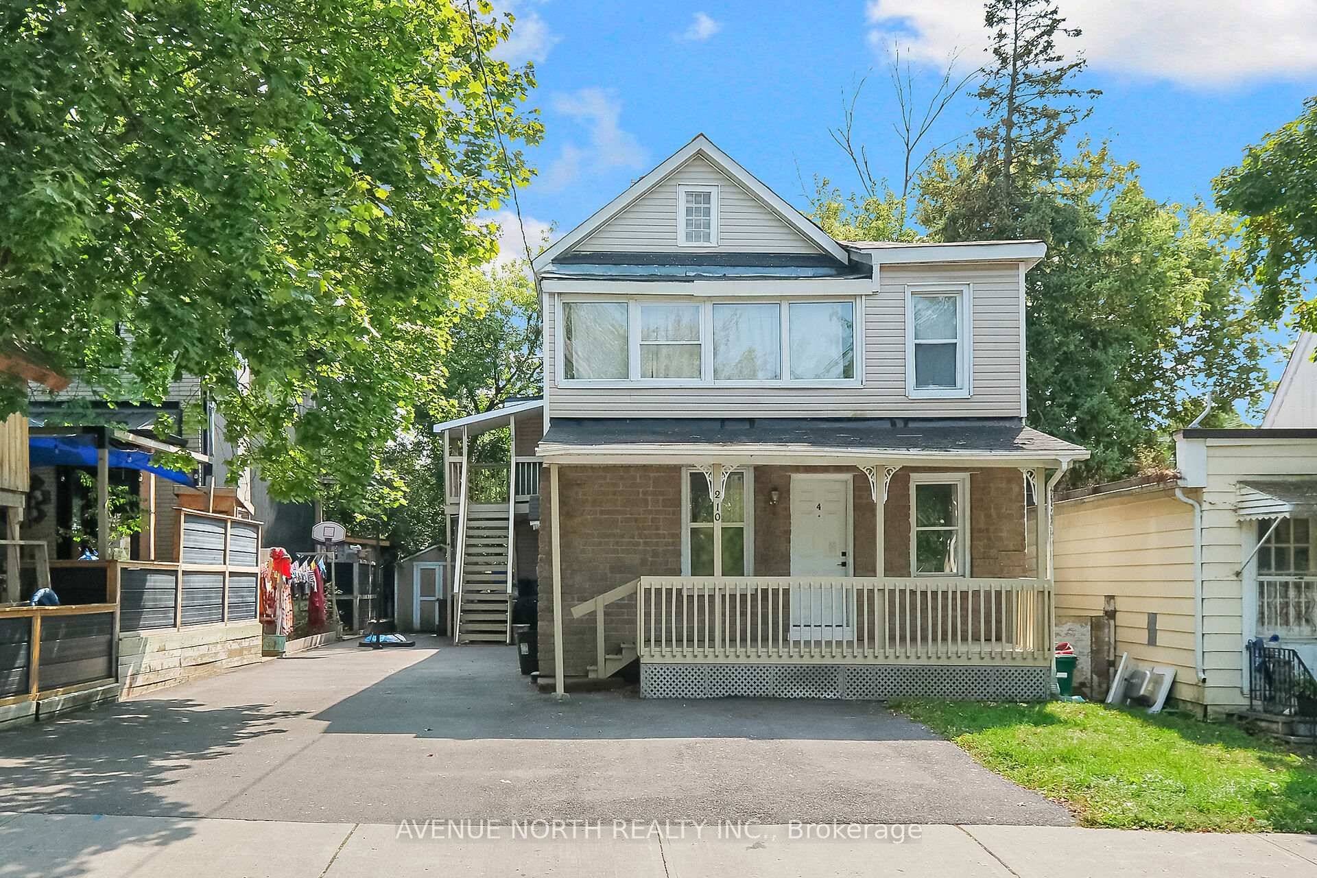 Fully Renovated 4 Unit Building in Desirable Beechwood Village.