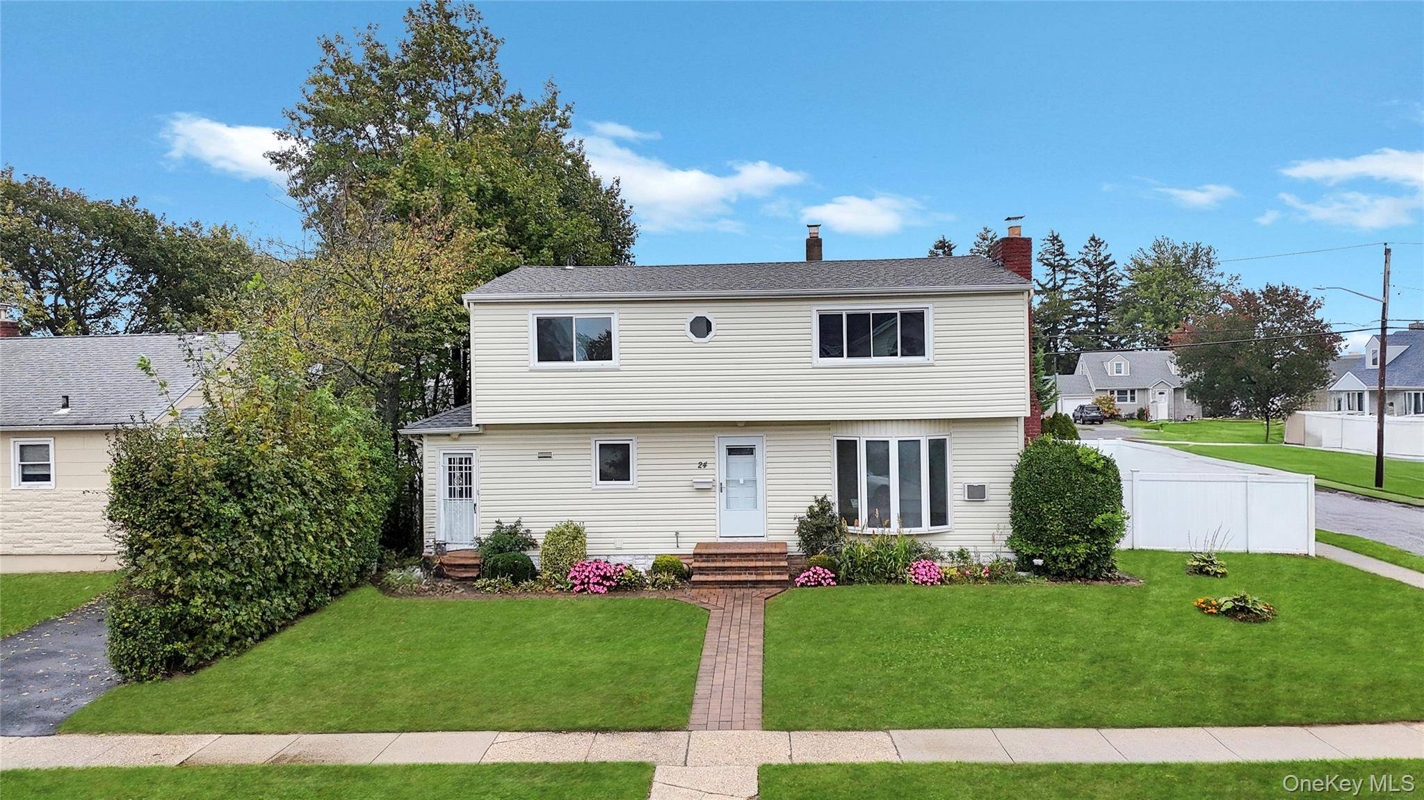 Welcome to this stunning Duplex Colonial, a perfect blend of classic charm and modern convenience.