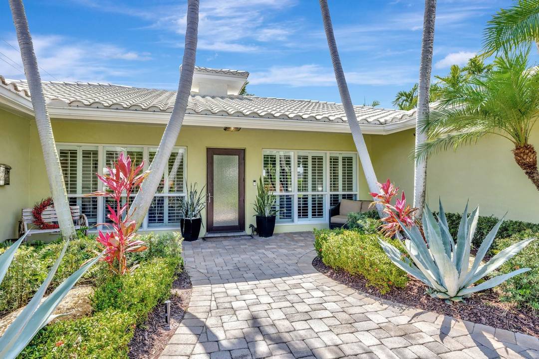 Experience refined South Florida living in this stunning 3, 000 sq ft pool home, perfectly positioned on an oversized, lushly landscaped corner lot in the prestigious Coral Ridge neighborhood.