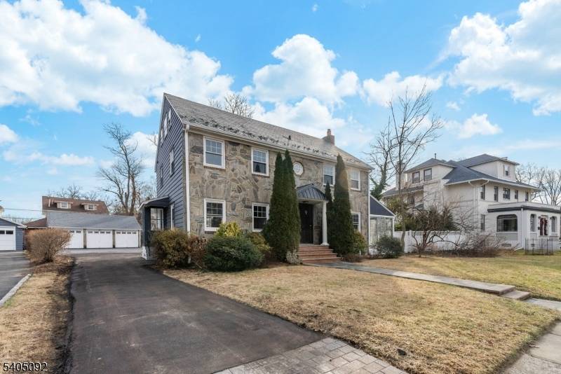 With renovation just completed in 2026, this large 3 level property is set on a quiet, tree lined street in the coveted Tuxedo Park section of South Orange.