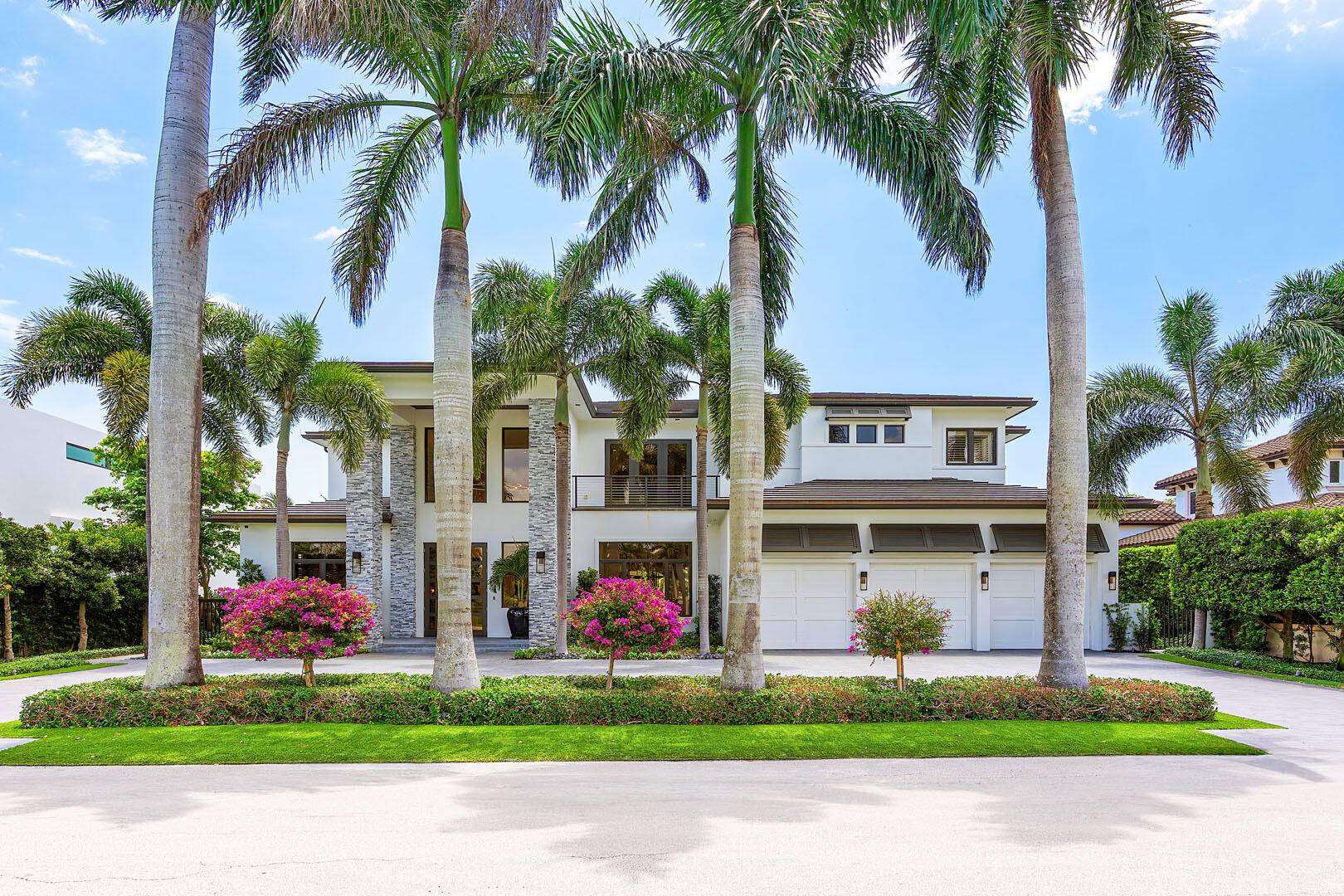 A rare opportunity to own one of only 14 exclusive residences within the prestigious Royal Palm Yacht Country Club, offering uninterrupted front and rear vistas of the Jack Nicklaus Signature ...