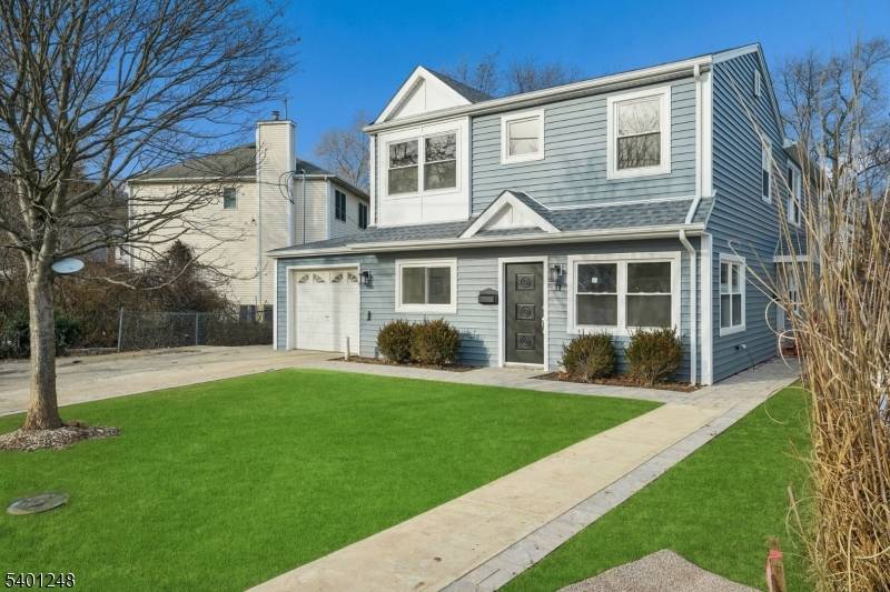 Welcome to this impeccably renovated 3 bed, 2 full bath, first floor residence part of a thoughtfully reimagined two unit home featuring high end upgrades throughout.