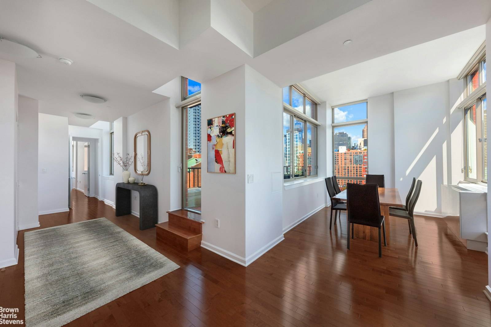 BACK ON THE MARKET ! Floor to ceiling windows bathe this stunning 5 room 2 bedroom, 2 bathroom home in natural light, offering breathtaking panoramic views of the Manhattan skyline.