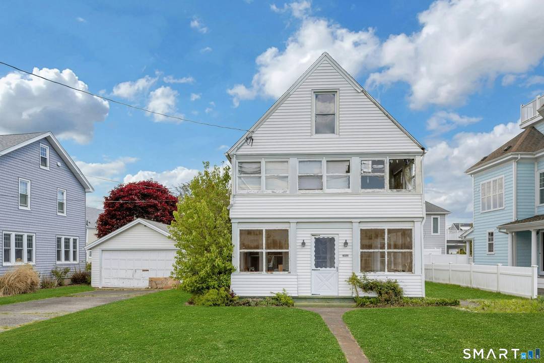An exceptional opportunity to transform and reimagine your dream coastal retreat on this rare double lot property in the highly desirable and historic Laurel Beach Association.