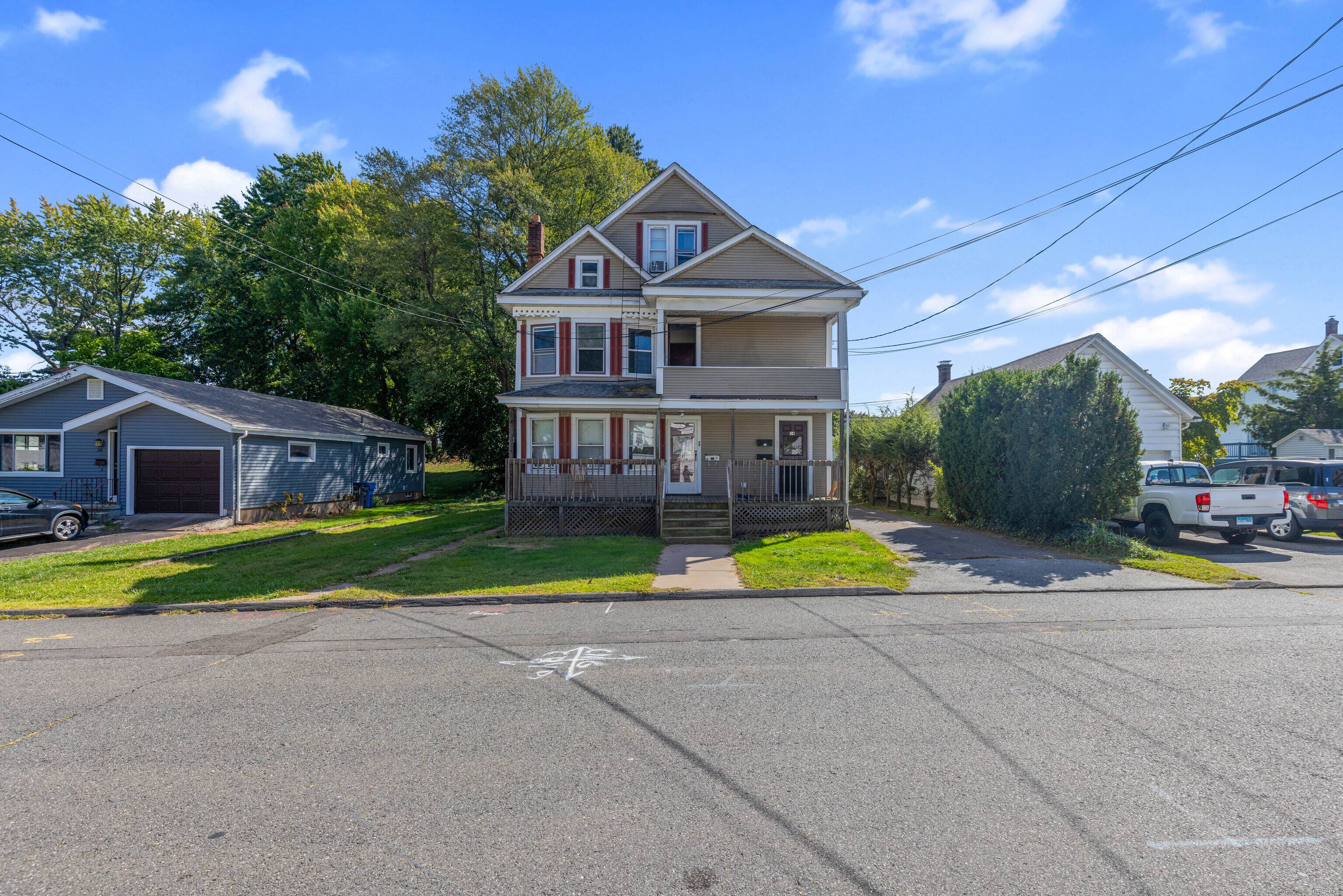 In search of a well maintained three family home in a tranquil setting ?