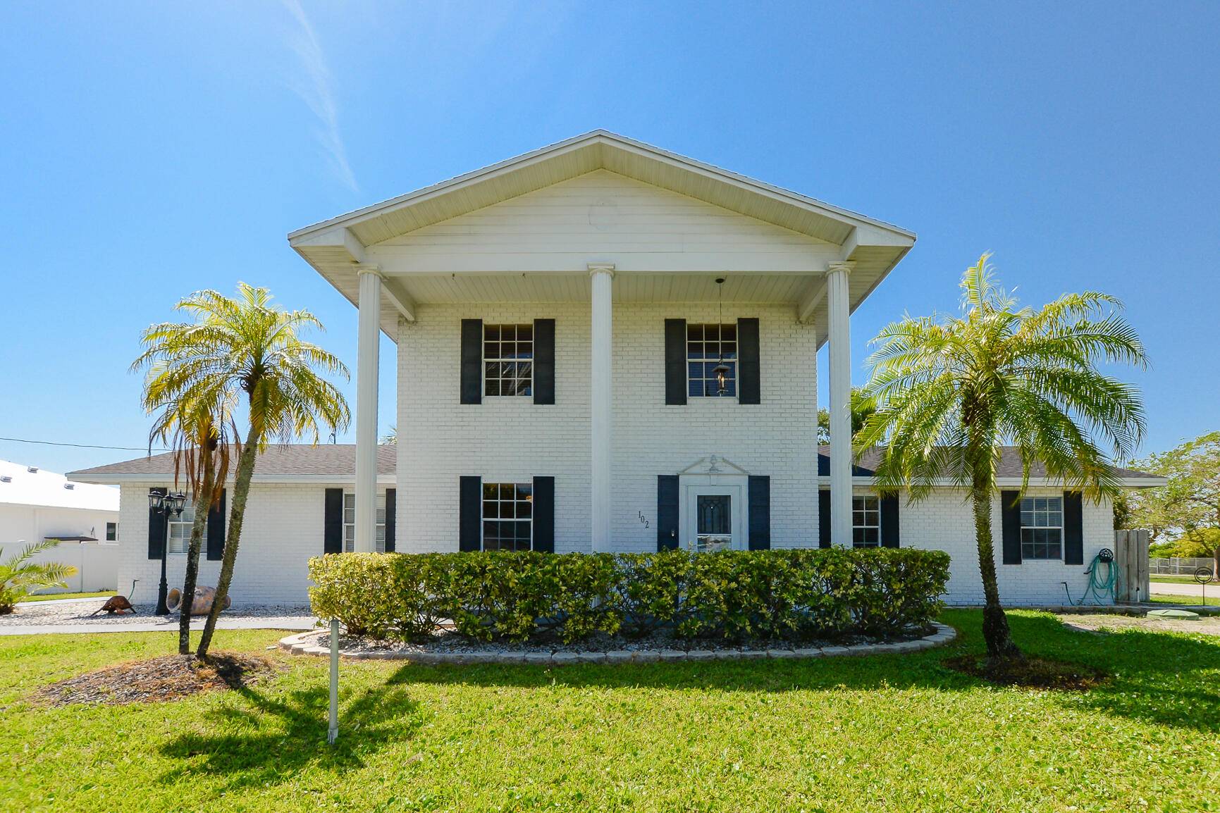 Fabulous 2 story Colonial Pool home custom built with lovely corner lot.