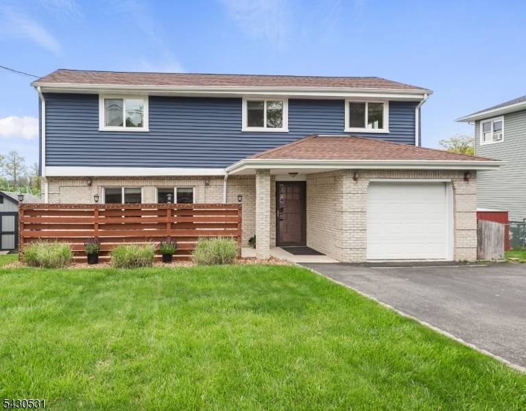 Welcome home to this fabulous lakefront in Roxbury on Lake Hopatcong !