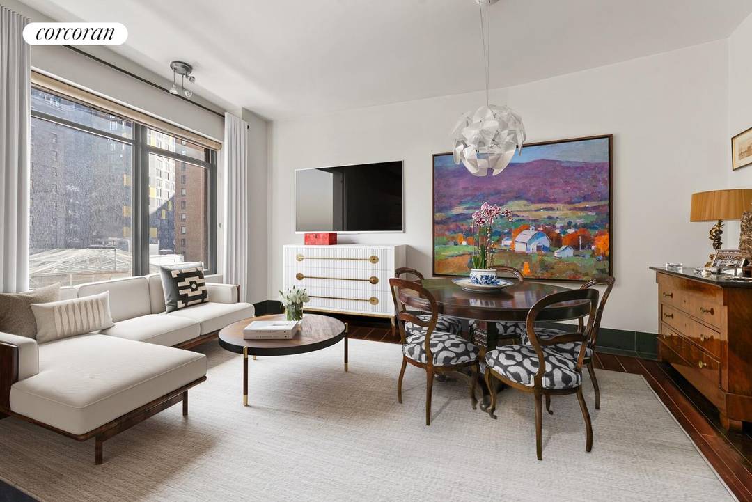 Welcome to Residence 18E at 40 Broad Street, an expansive approximately 1, 115 square foot home in the heart of the Financial District.