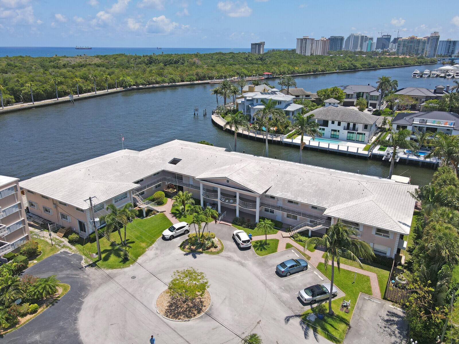 Immerse yourself in the luxury living with this prestigious offering a first floor corner unit overlooking the Intracoastal, in the highly sought after Coral Ridge enclave where opulence meets tranquility.