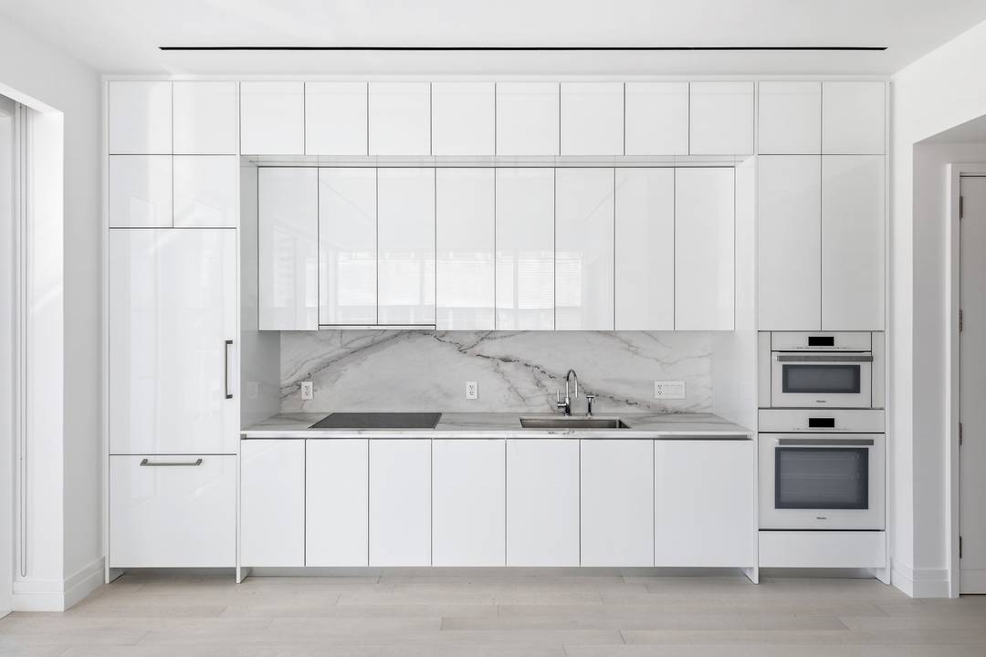 This outstanding 835 square foot one bedroom, one and a half bath light filled corner residence features 22 linear feet of terrace space with exposures to the south and west.