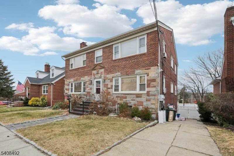 Exceptional brick and stone 6 bedroom multi family home !