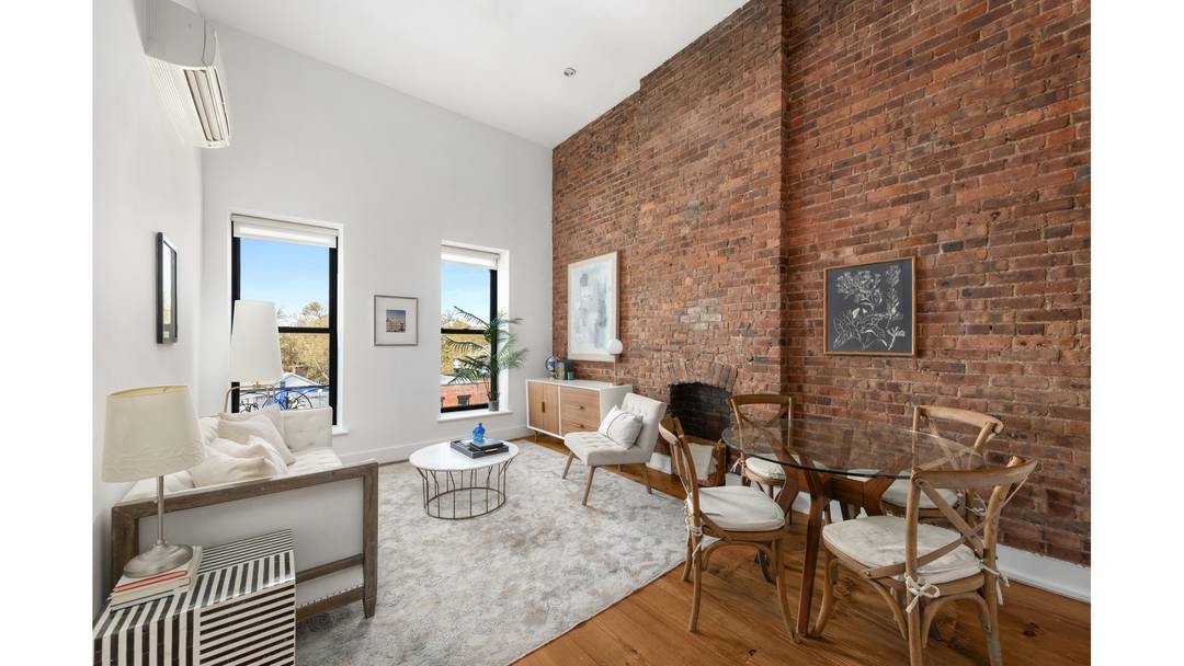 Welcome to loft living ! 13 foot ceilings, oversized windows, exposed brick, and a quintessential industrial Brooklyn vibe.