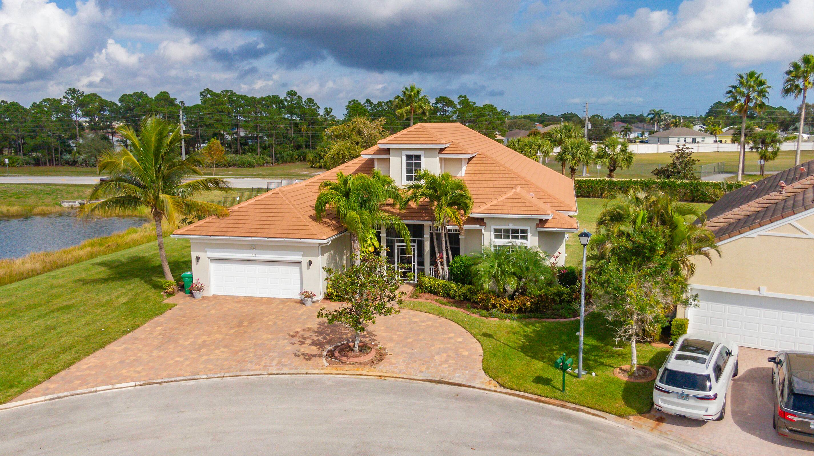 Stunning fully upgraded 4 bedroom Office possible 5th bedroom, 3 bath home on a lakefront private cul de sac oversized lot with a newer 2020 roof !