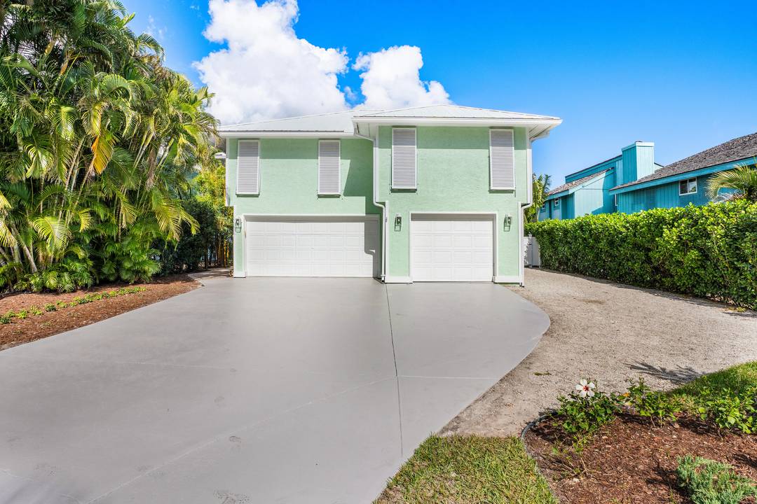 Stunning Waterfront Home in Mariner Cay with No HOA fees or Restrictions !