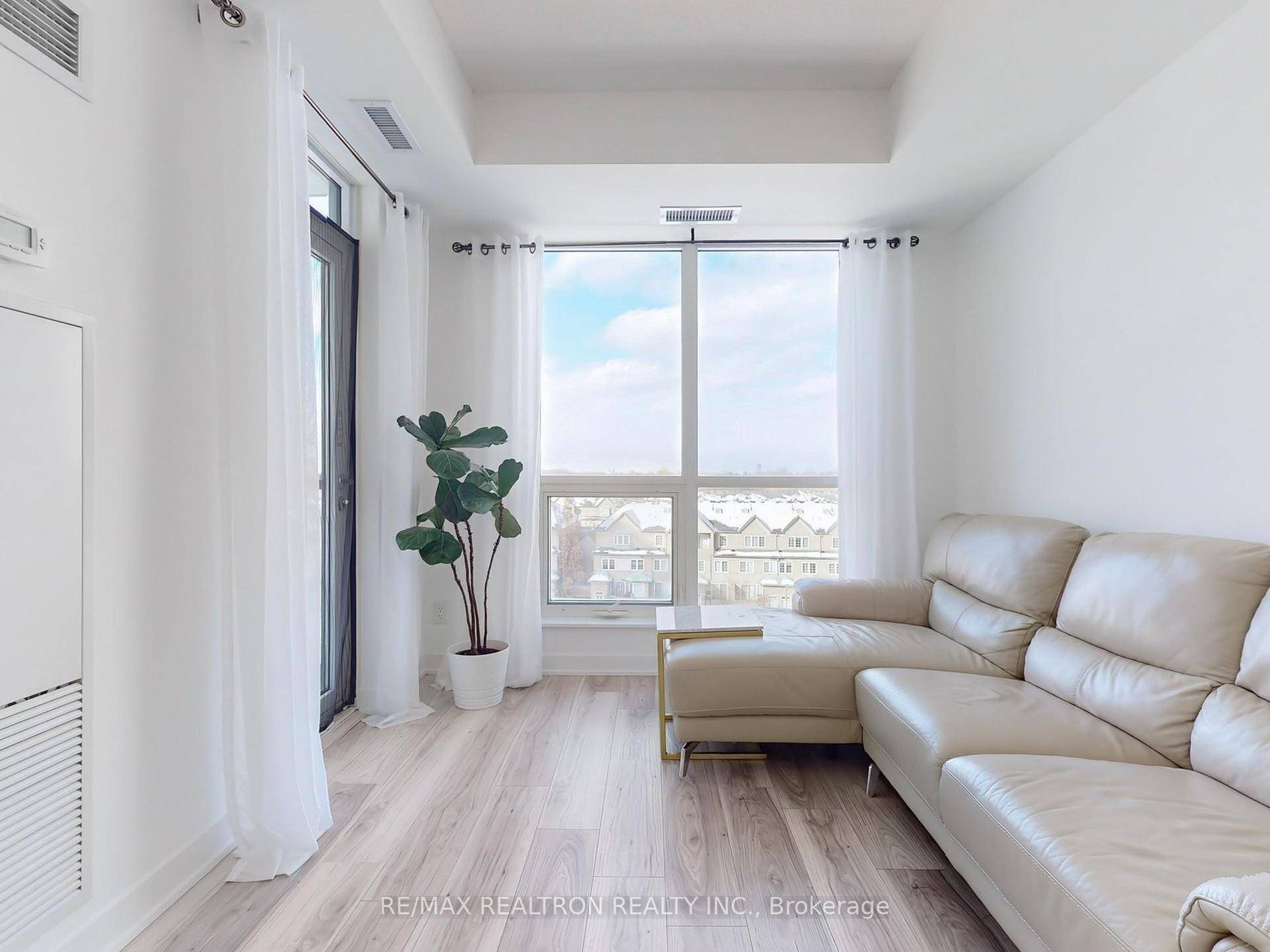 Welcome to this bright and spacious 2 Den, 2 Bath corner unit in the sought after Joy Condo Only 7 Years New !