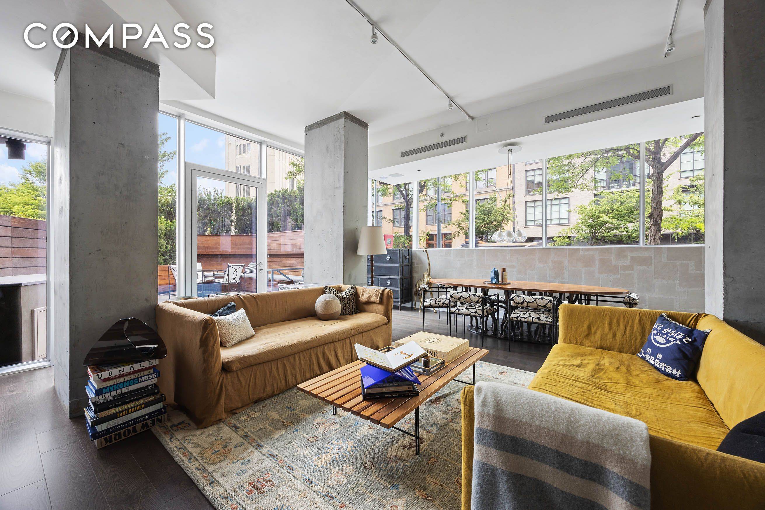 Experience townhouse style Tribeca living in this recently renovated two bedroom, two and a half bathroom duplex, offering an expansive, light filled layout with soaring 11 foot ceilings, bold columns, ...