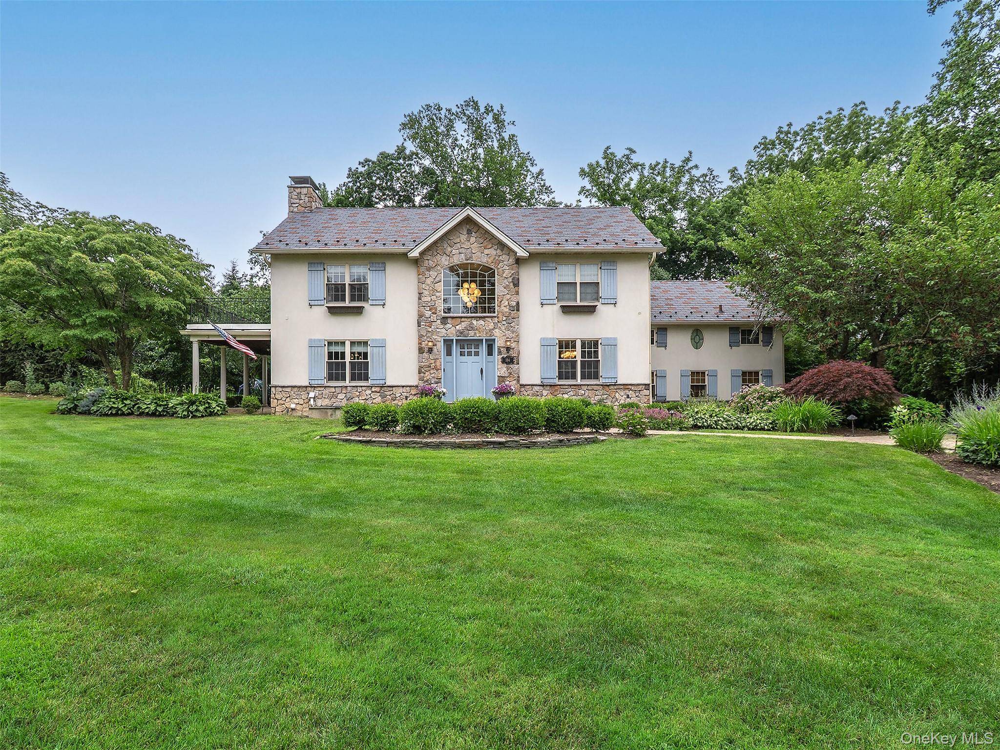 Welcome home ! This beautifully renovated Center Hall Colonial offers 5 bedrooms, 4.