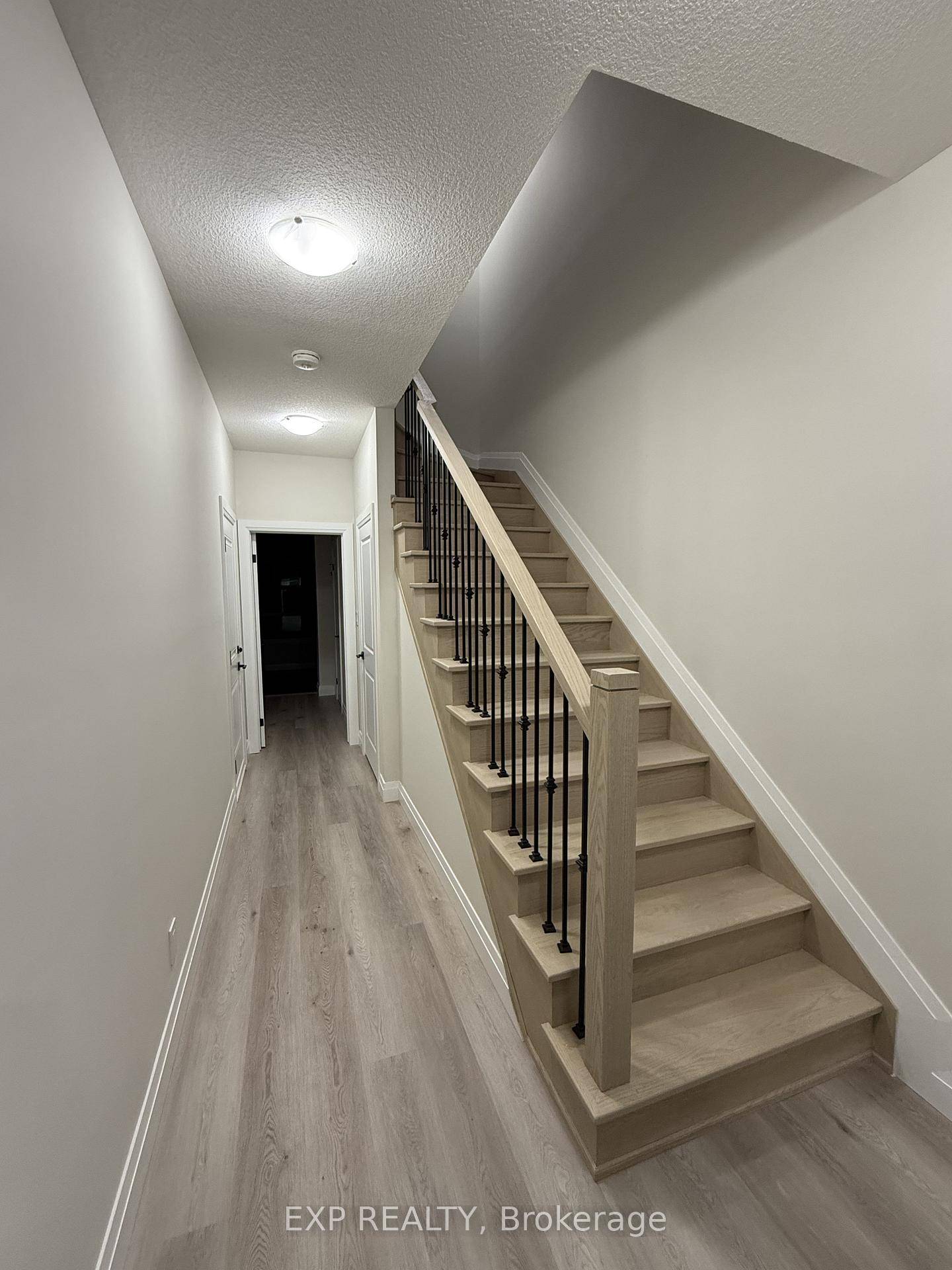 Discover contemporary living at Corner Unit townhome at 1 Keystone Trail in the sought after Welland community.