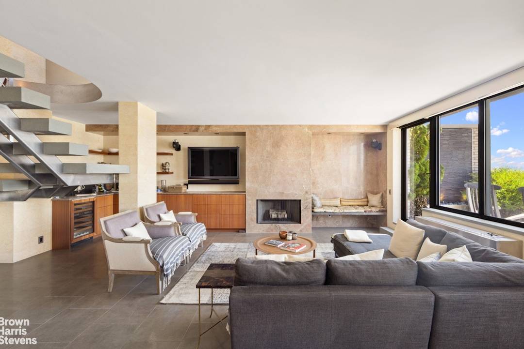 Enjoy brilliant light and unobstructed Hudson River and Statue of Liberty views from this rare duplex penthouse located in a full service doorman condominium on a quiet cul de sac ...