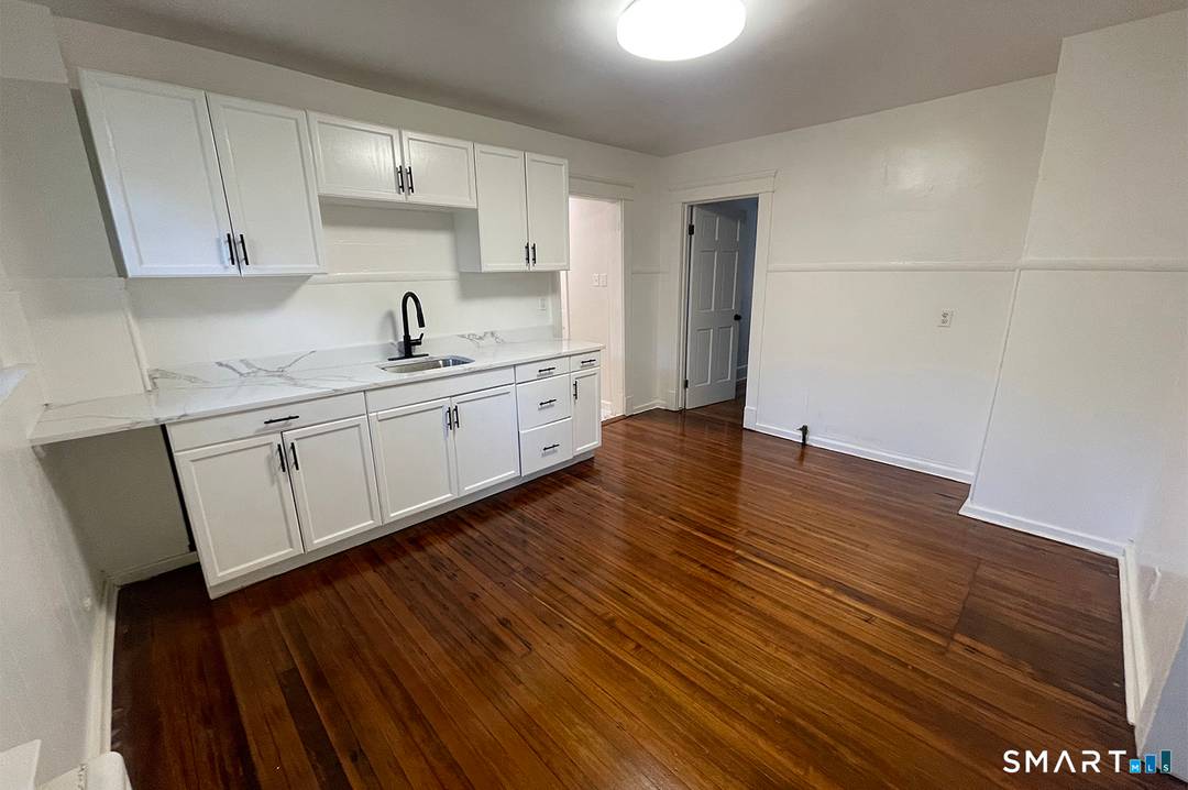 Located in the peaceful, woodsy neighborhood of Fair Haven Heights, this newly renovated 2 family home offers a blend of tranquility, privacy, and modern updates.