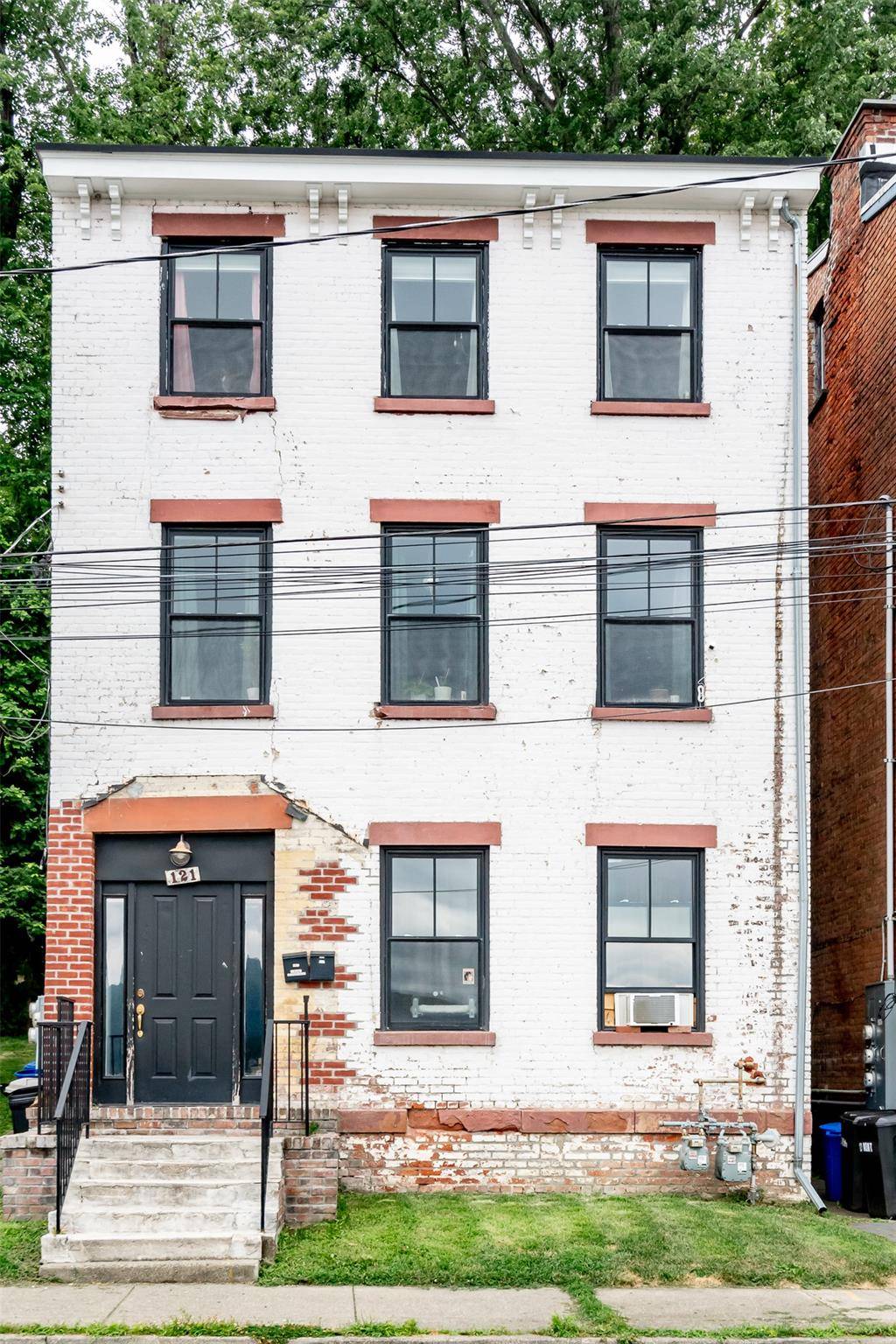 Perched above the Hudson, this thoughtfully renovated two family home offers sweeping river views from every level.