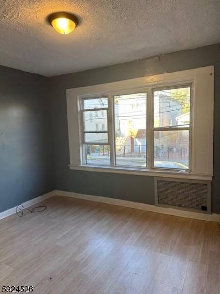 Great location, well maintained multi family renovated in 2022, hardwood floors with stainless kitchen appliances.