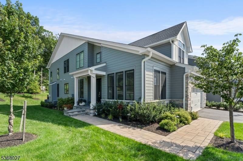 Professionally designed and only 2 years young, this like new Toll Brothers Serendipity model offers premium upgrades and designer finishes throughout.