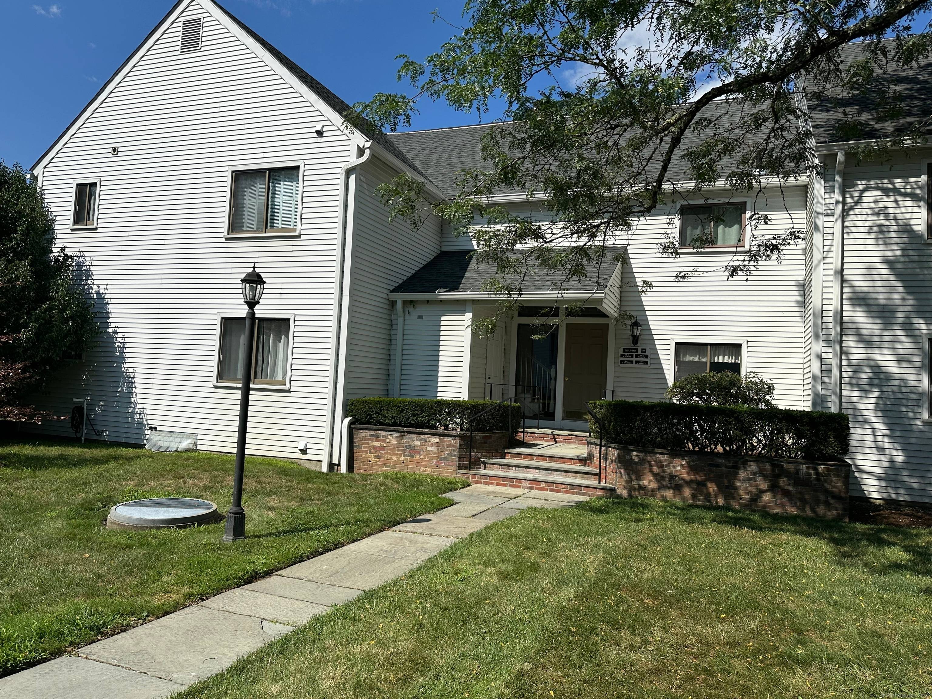 Wonderful first floor, corner condo in downtown Kent.