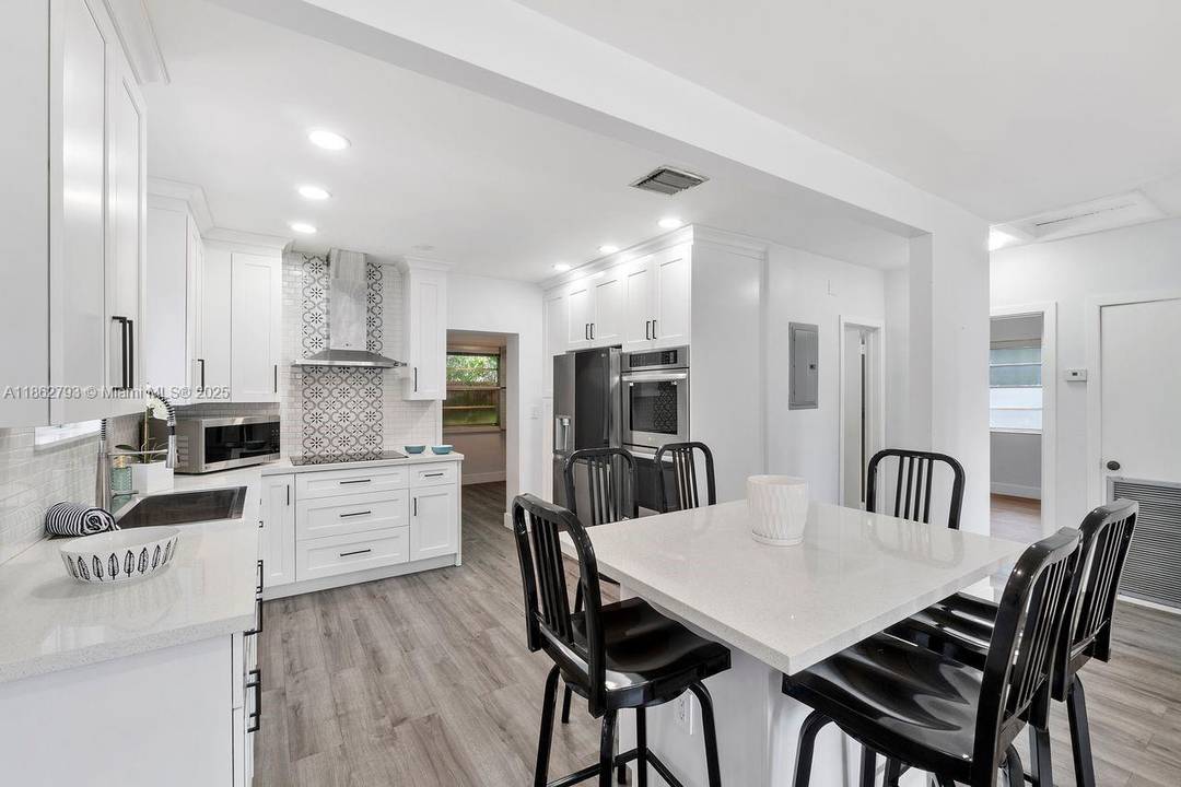 Why buy a condo when you can own this partially updated single family home and avoid condo maintenance fees !