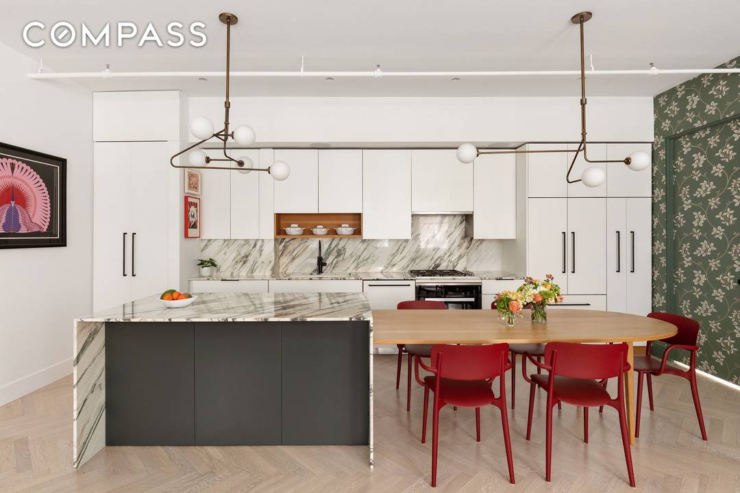 This impeccably designed three bedroom, two bathroom residence is a true masterpiece that underwent a renovation where no detail was left behind.