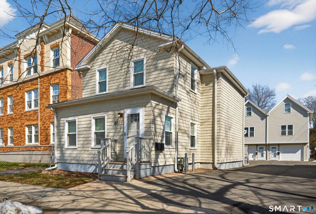 Two extremely well maintained two family homes on one lot in the East Rock section of New Haven.