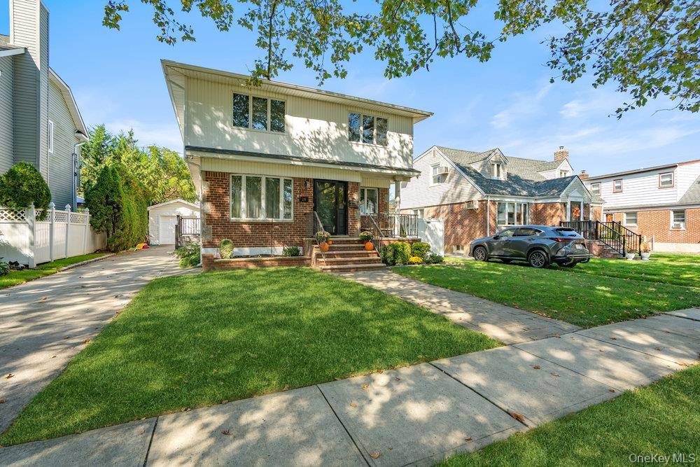 A rare blend of modern design and timeless charm in the heart of North New Hyde Park.