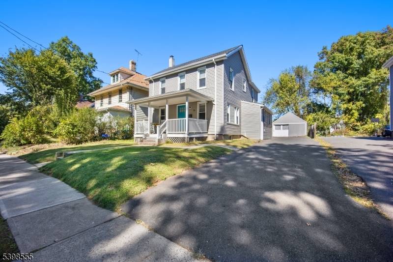 Welcome to 71 Central Ave a charming Colonial on a quiet street in the heart of Somerville.
