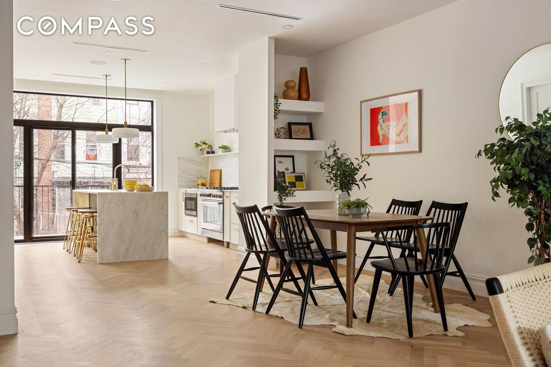 Originally built circa 1910, 131 Weirfield Street has been thoughtfully reimagined into a beautifully appointed two family residence that seamlessly blends timeless character with elevated, modern living.