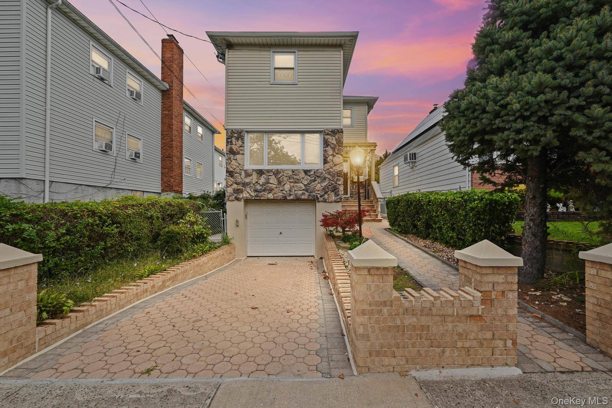 This exquisite single family detached home with private driveway and one car garage, beautifully renovated, sits on a generous lot.