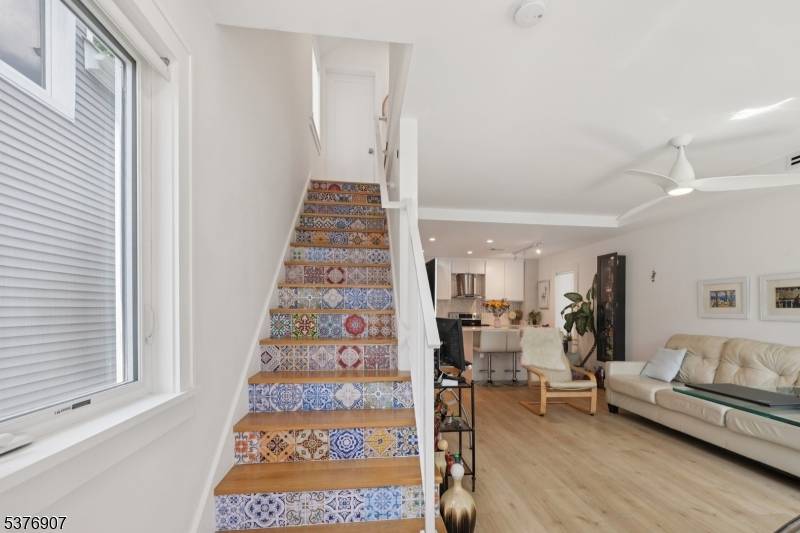 Experience luxury living in the heart of West Orange with this fully remodeled 2 bedroom, 2 bathroom home, rebuilt from the studs up with exceptional attention to detail.