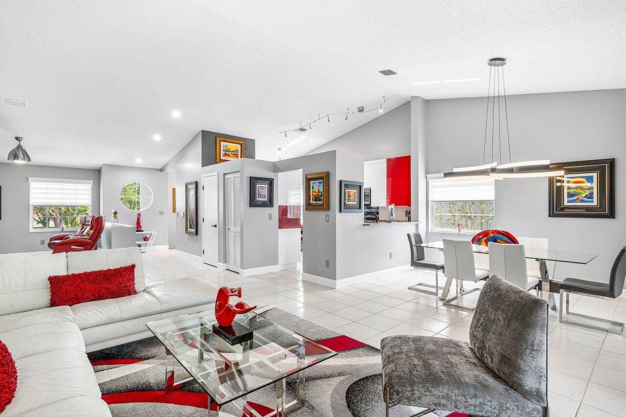 Check out this FULLY REMODELED 2BR 2BA Den condo in the sought after 55 community of Palm Isles III in Boynton Beach !