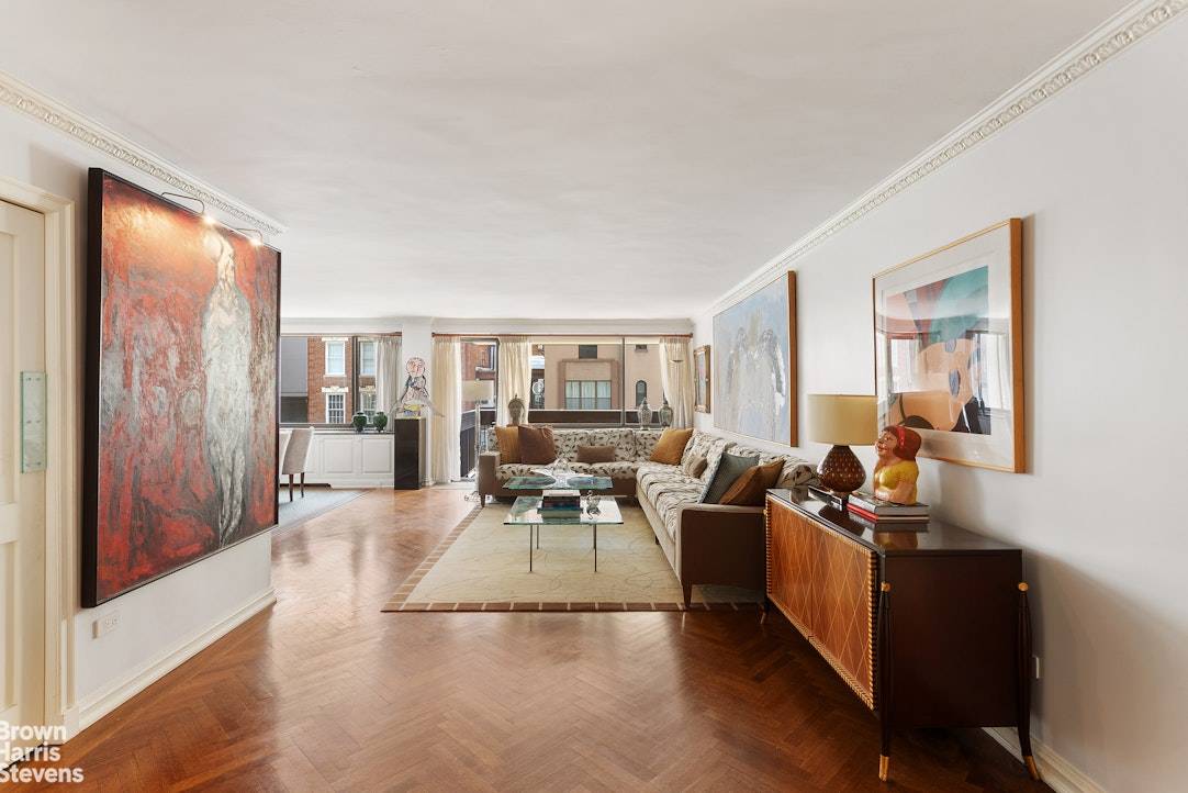A thoughtfully designed three bedroom, three bathroom residence located in a full service cooperative, just one block from Central Park.