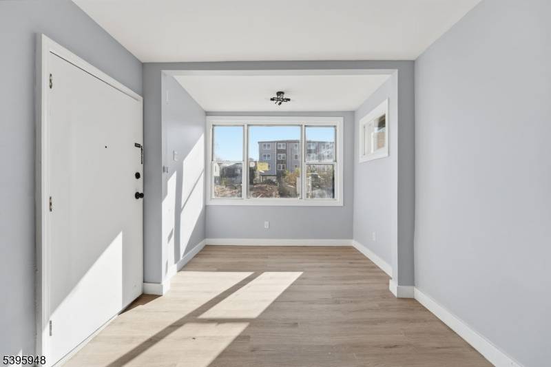 Beautifully renovated 2 family home in the heart of Passaic !