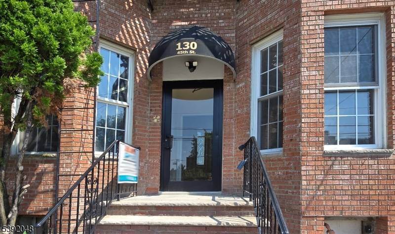 Welcome to 130 45th Street, a stunningly updated 2 bed, 2 bath condominium offering 670 sq ft of thoughtfully designed living space in a boutique 6 unit building.