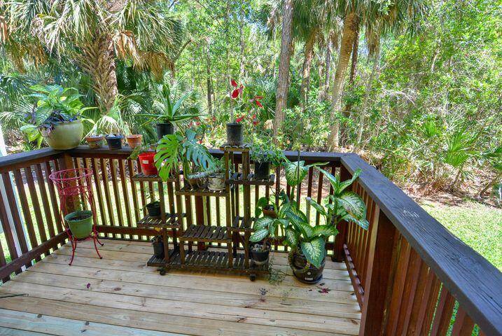 RUN, DON'T WALK TO THIS AMAZING 1 STORY CORNER UNIT IN HOBE SOUND !