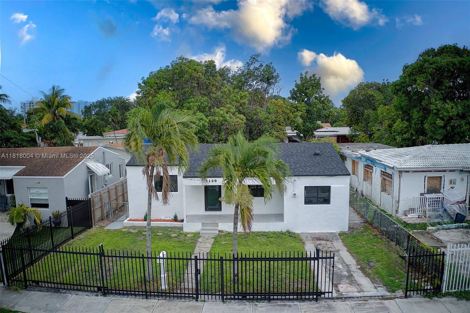 Fully renovated 4 2 impact windows doors, modern kitchen w SS appliances, updated baths, NEW central A C amp ; ducts, and waterproof laminate flooring throughout.
