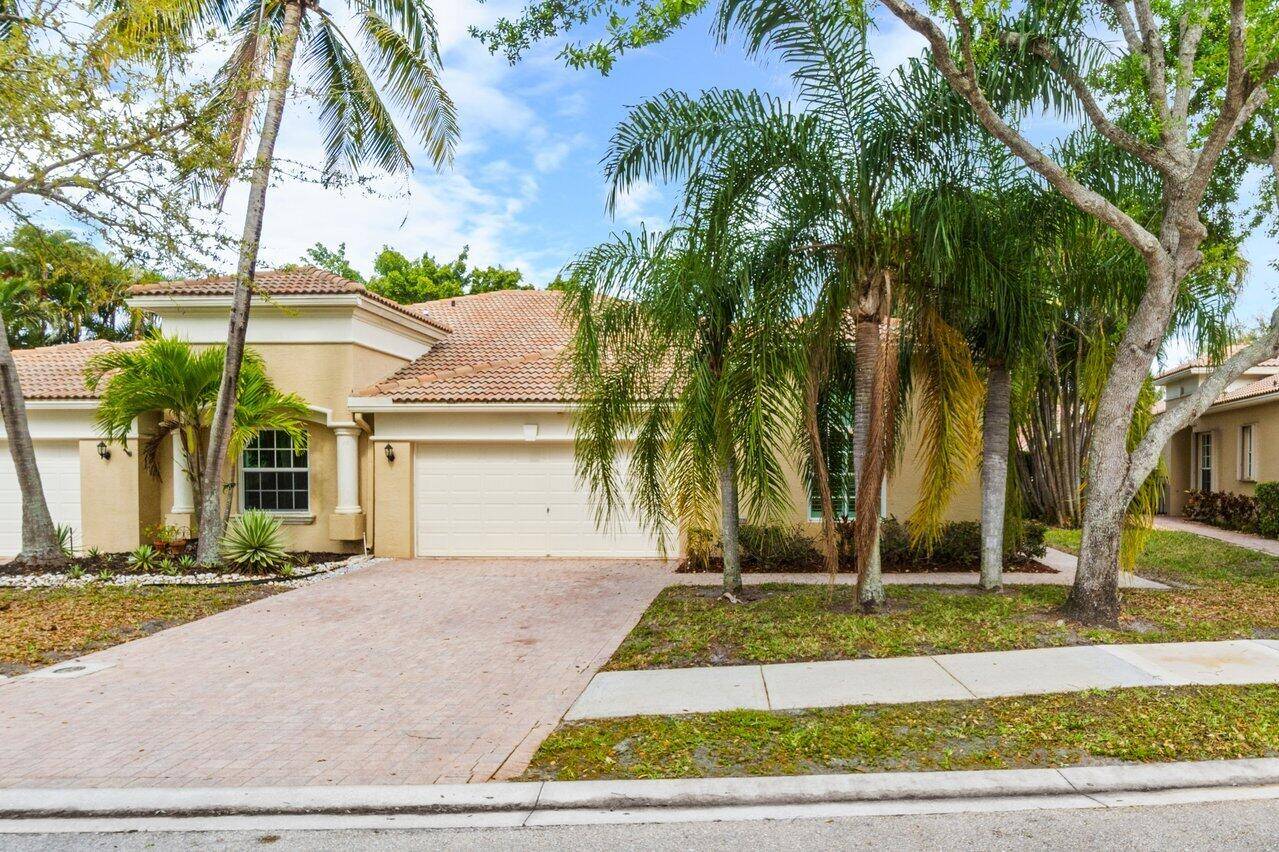 NEW ROOF IN PROCESS ! This beautifully renovated 3 bedroom, 2 bathroom villa offers modern living with a 2 car garage.
