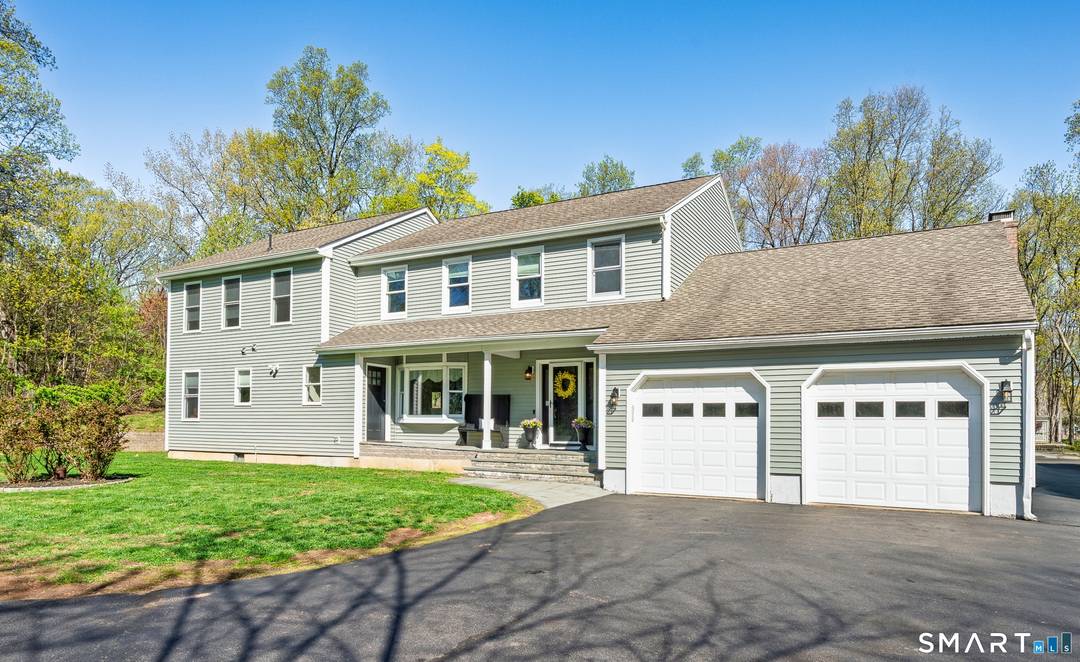 STUNNING 5 bedroom, 4. 5 bath Colonial set on almost 2 private acres in a peaceful cul de sac setting.