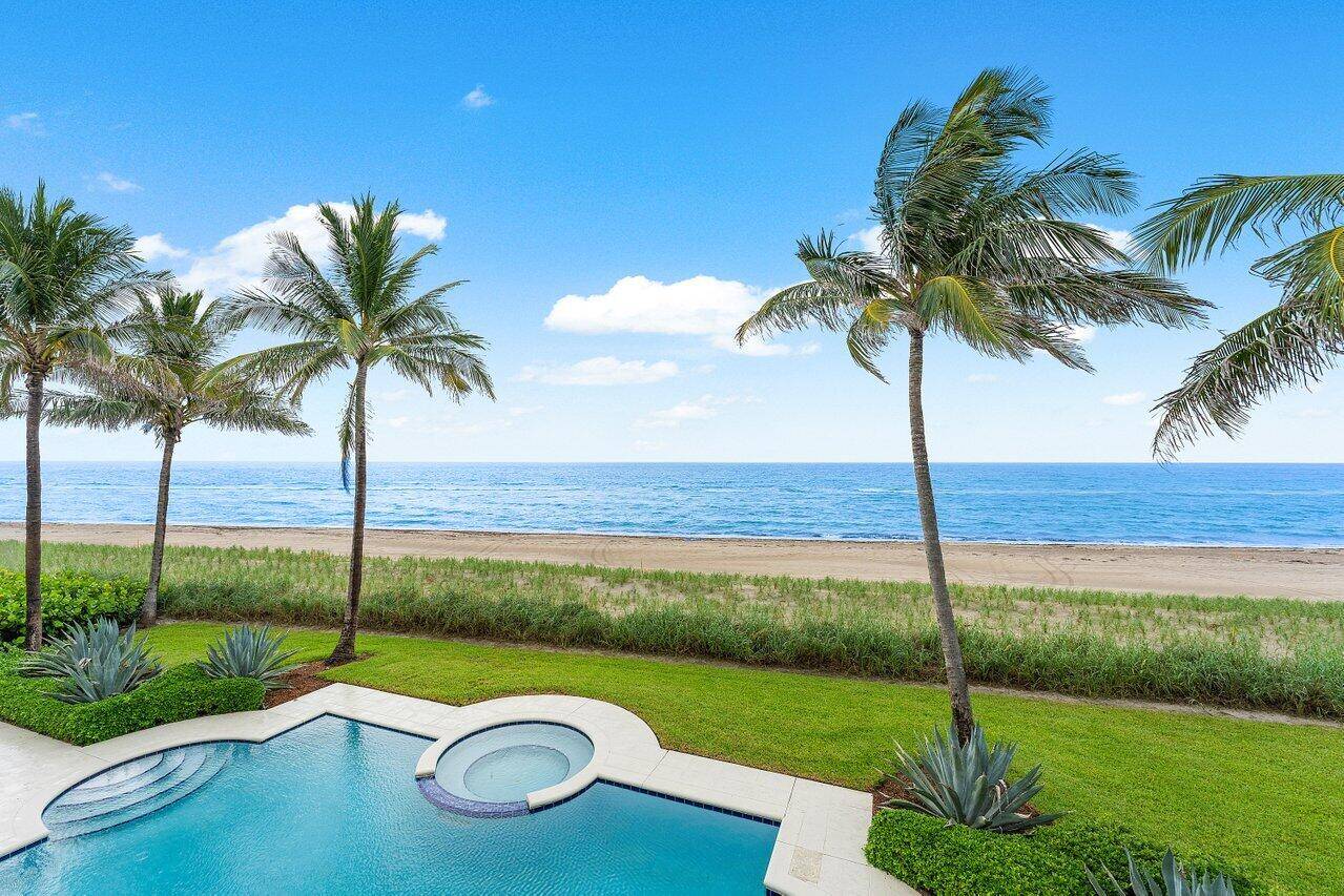 This stunning 10, 000 sq ft oceanfront estate embodies luxury living, featuring marble floors, vaulted ceilings, balconies w breathtaking ocean views.