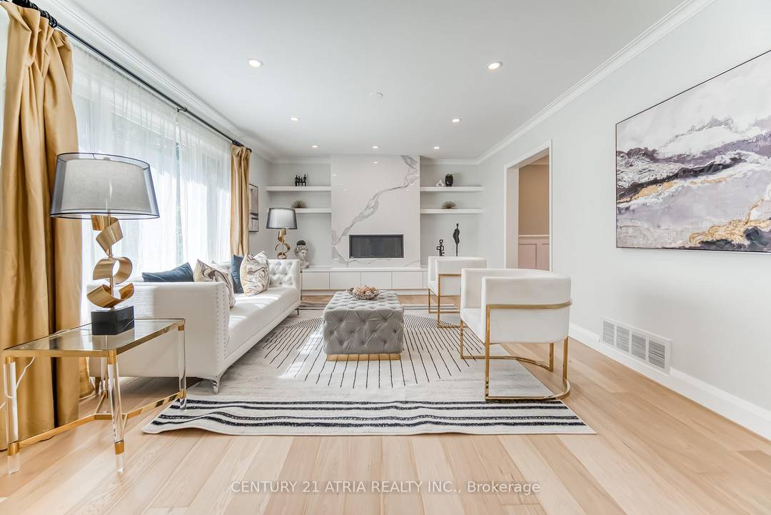 Discover this exquisite residence featuring a beautifully designed open concept kitchen, a spacious dining room, living room and a cozy family room.